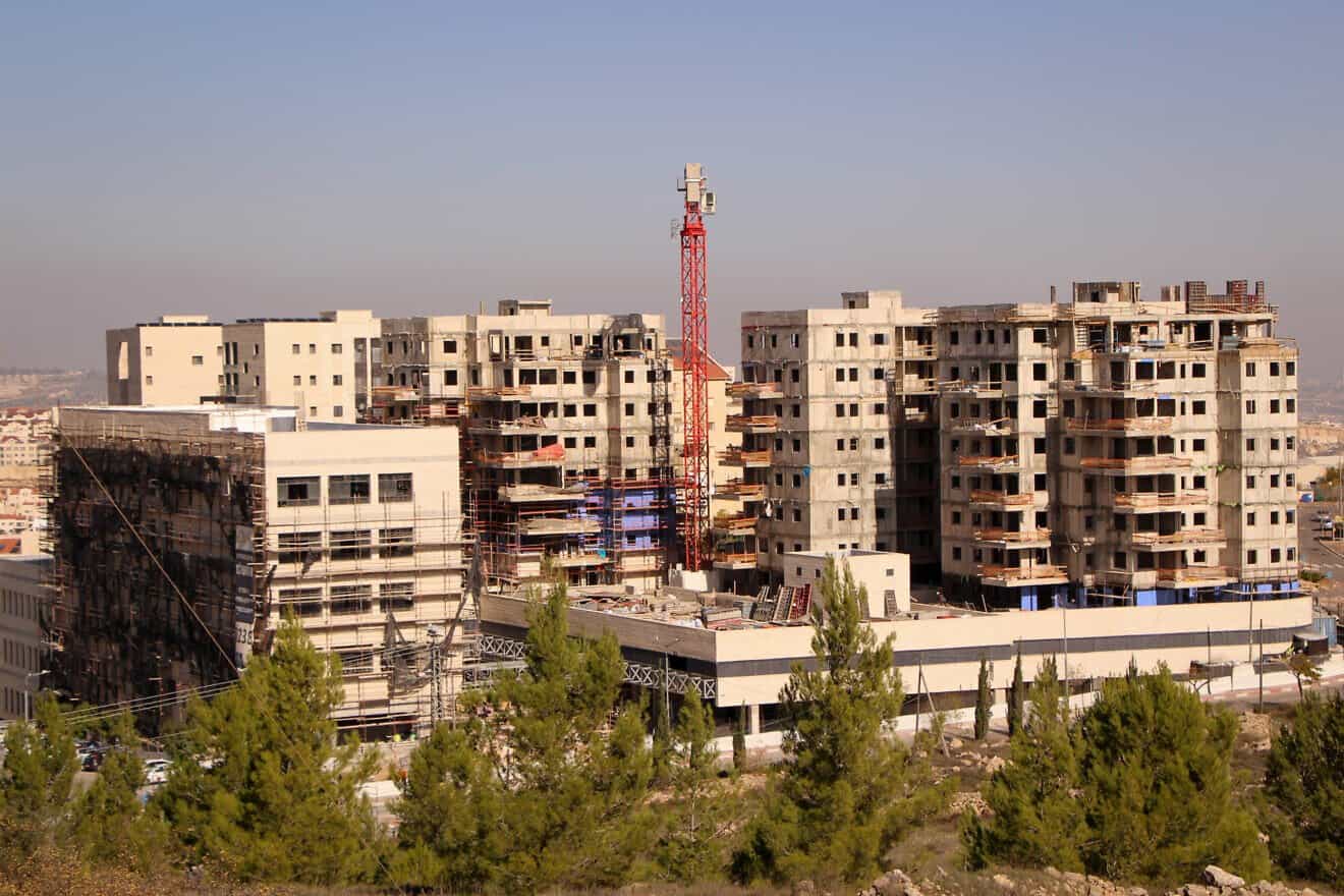 Construction of a new apartment building in the Israeli city of Efrat, in the Gush Etzion region of Judea, Dec. 1, 2020. Photo by Gershon Elinson/Flash90.