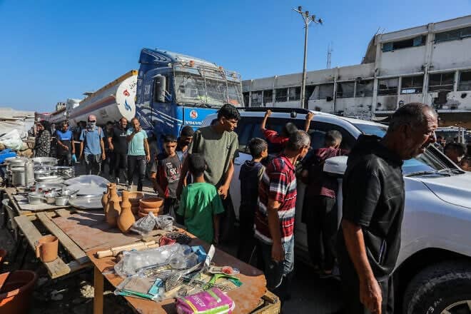Empty UNRWA and World Food Program trucks  in Khan Yunis, the southern Gaza Strip, head to the Kerem Shalom Crossing to load humanitarian aid and fuel, July 24, 2025. Photo by Abed Rahim Khatib/Flash90.