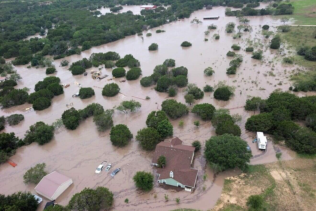 Search-and-rescue operations continued for missing persons after the Texas Hill Country, a region spanning the central and southern parts of the state, became inundated after torrential rain, causing the Guadalupe River to rise as much as 30 feet in some places, July 5, 2025. Credit: U.S. Coast Guard via Wikimedia Commons.