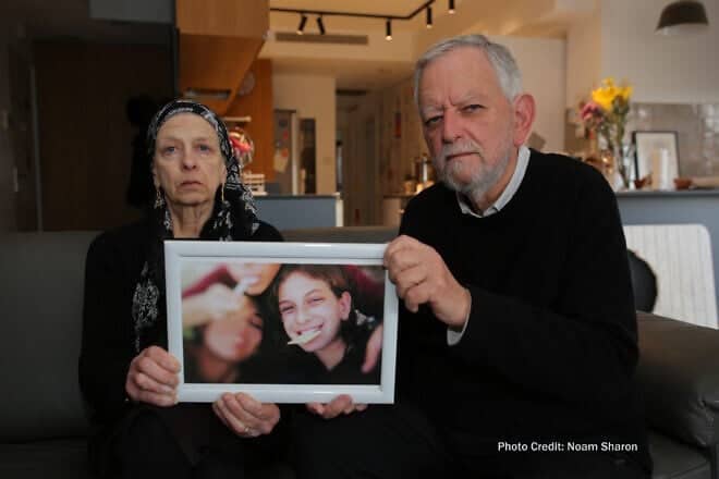 Arnold Roth and his wife, Frimet, hold a picture of their murdered daughter Malki. July 15, 2025. Photo by Noam Sharon.