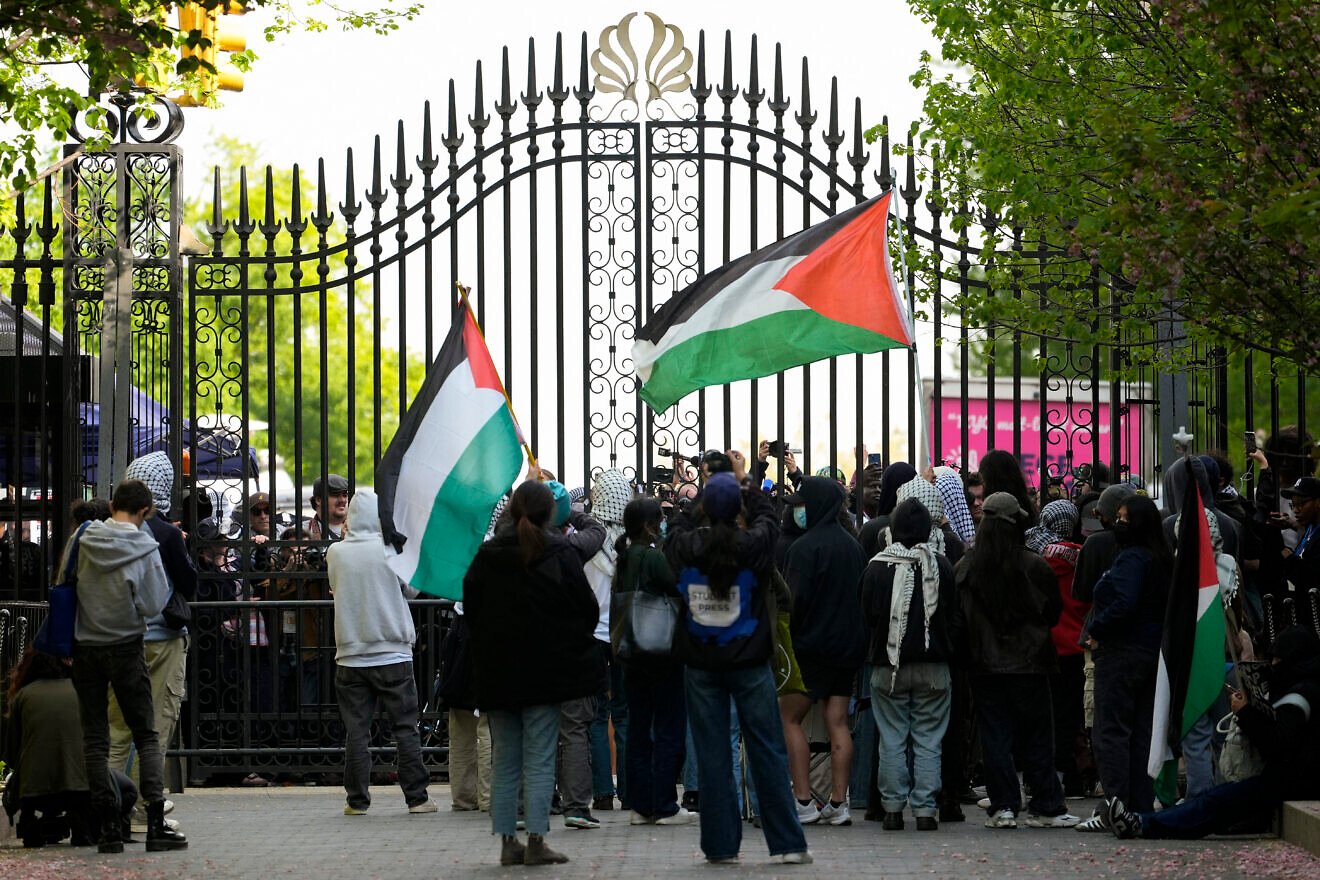 Anti-Israel protesters at the entrance gates of Columbia University in New York City, on April 30, 2024. Credit: Mary Altaffer/pool/AFP via Getty Images.