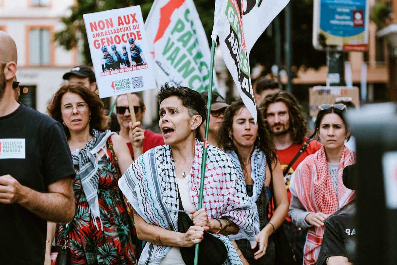Anti-Israel protesters at the Tour de France in Toulouse, on July 13, 2024. Photo by Pat Batard/Hans Lucas/AFP via Getty Images.