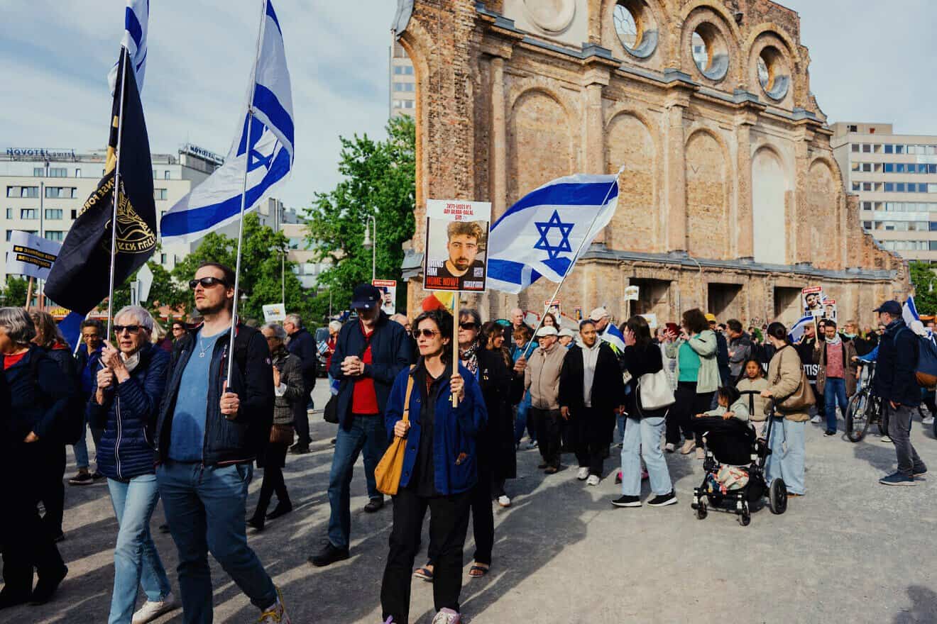 People participate in the "March of Life," which marks 80 years since the end of the Holocaust, under the motto "Courageously Standing for Jewish Life and Israel," in Berlin, Germany on May 7, 2025. Photo by Stefan Frank/Middle East Images/AFP via Getty Images.