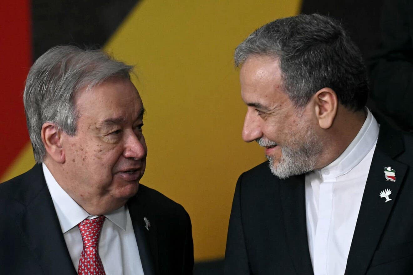 U.N. Secretary-General António Guterres and Iranian Foreign Minister Abbas Araghchi talk during the BRICS summit in Rio de Janeiro, Brazil, on July 7, 2025. Photo by Mauro Pimente/AFP via Getty Images.