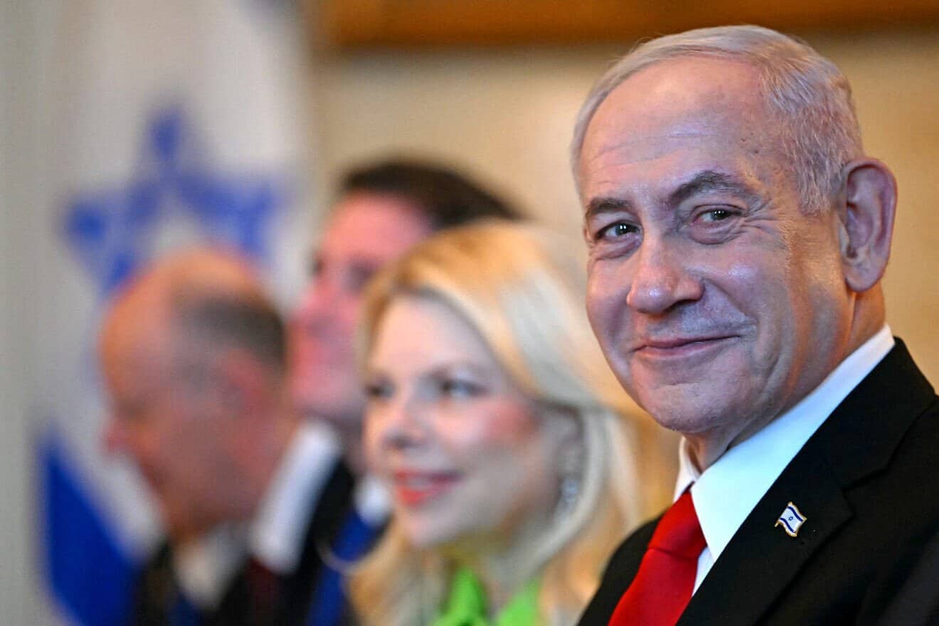 Israeli Prime Minister Benjamin Netanyahu and his wife, Sara, meet with U.S. President Donald Trump (unseen) at the Blue Room of the White House in Washington, D.C., on July 7, 2025. Photo by Andrew Caballero-Reynolds/AFP via Getty Images.