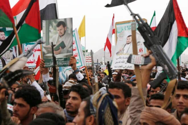 Houthi terrorist supporters brandish weapons during a protest in support of the Palestinians, in Sanaa, July 4, 2025. Photo by Mohammed Hamoud/Getty Images.