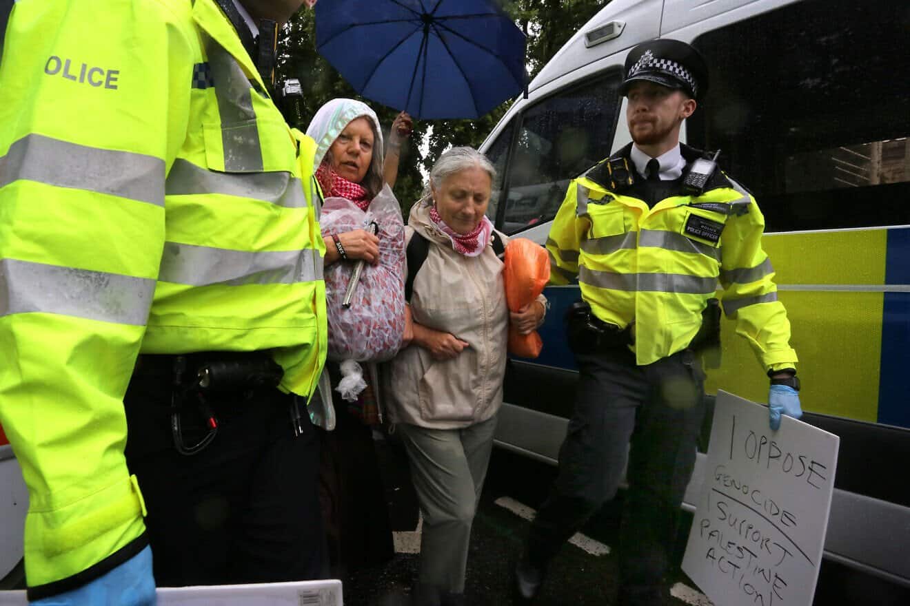 Supporters of Palestine Action are led away by police during a protest in London, on July 19, 2025. Photo by Martin Pope/Getty Images.