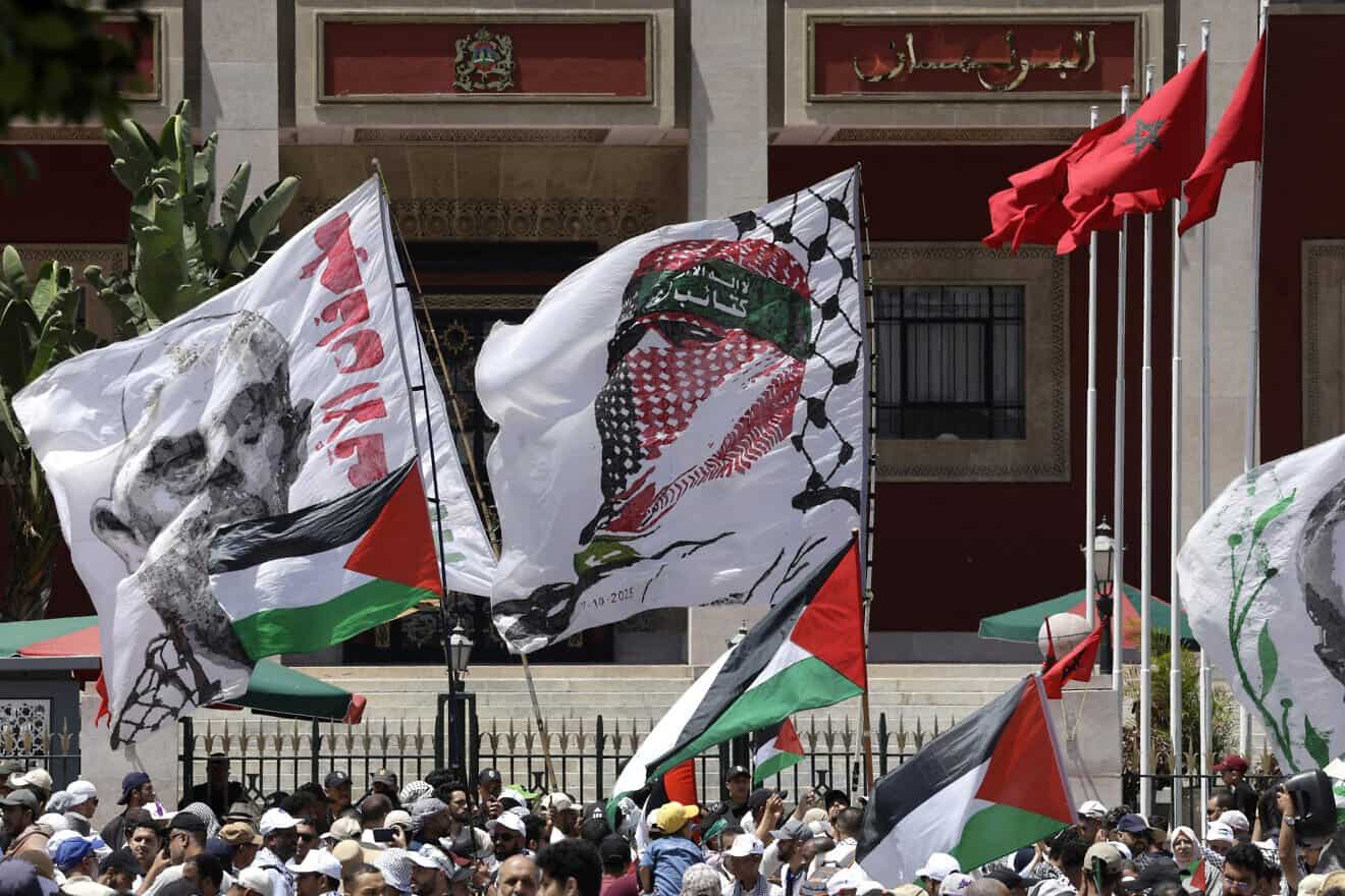 Moroccans wave Palestinian flags during a march to express their solidarity with the Palestinians in the Gaza Strip, in Rabat, on July 19, 2025. Photo by Abdel Majid/AFP via Getty Images.