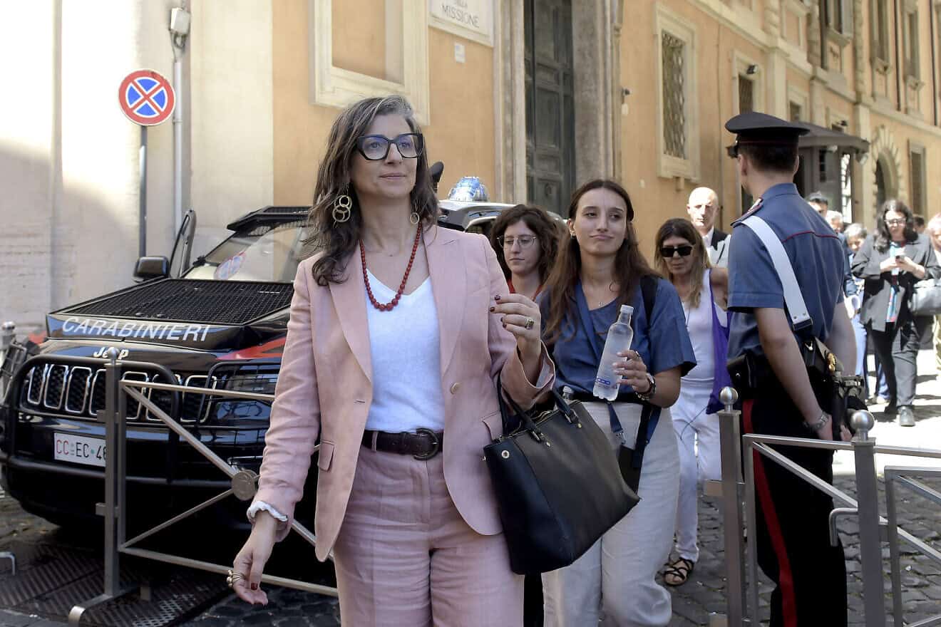 Francesca Albanese, United Nations Special Rapporteur, greets pro-Palestinian protesters gathering in front of Montecitorio, after presenting  her report, "From an Economy of Occupation to an Economy of Genocide," at the Chamber of Deputies in Rome, on July 29, 2025. Photo by Simona Granati-Corbis/Corbis via Getty Images.