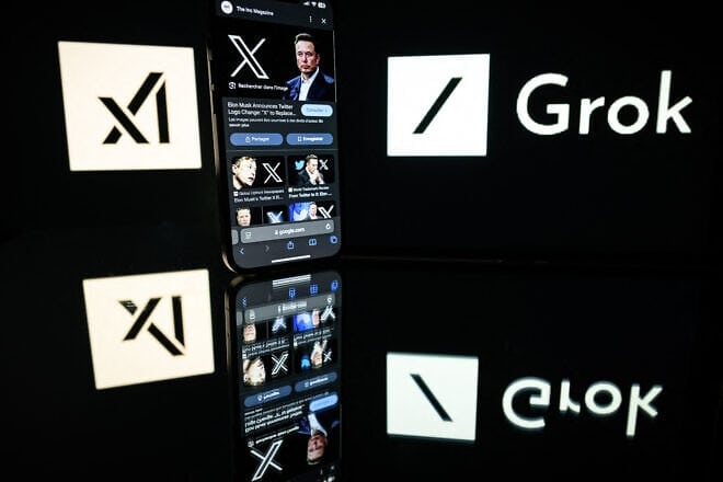 This photograph taken on Jan. 13, 2025, in Toulouse, France, shows screens displaying the logo of Grok, a generative artificial-intelligence chatbot developed by xAI, the U.S. company specializing in artificial intelligence created by Elon Musk. Photo by Lionel Bonaventure/AFP via Getty Images.
