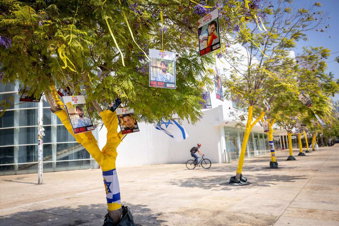 Images of hostages still being held by Hamas and Palestinian terrorists in the Gaza Strip posted on Habima Square in Tel Aviv, July 28, 2025. Photo by Miriam Alster/Flash90.