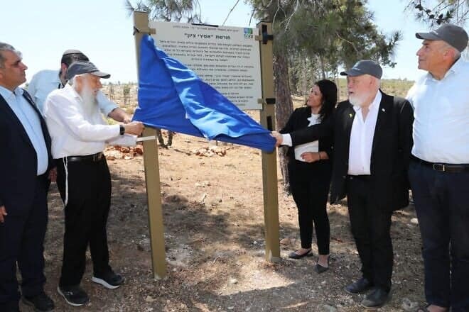 From left: Knesset member Ofir Sofer, minister of aliyah and integration; Rabbi Yosef Mendelevitch; Ifat Ovadia-Luski, chairwoman of Keren Kayemeth LeIsrael-Jewish National Fund; and Ronen Plot, the mayor of Nof HaGalil, at the dedication of a new Israeli tree grove in honor of former Prisoners of Zion, July 6, 2025. Credit: Anat Harmoni, KKL-JNF Photo Archives.