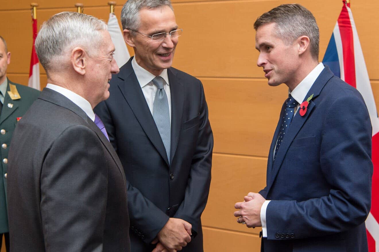 Then-British Defense Minister Gavin Williamson (right) meets with U.S. Secretary of Defense Jim Mattis (left) and NATO Secretary-General Jens Stoltenberg in Brussels in November 2017. Photo by U.S. Air Force Staff Sgt. Jette Carr/DOD via Wikimedia Commons.