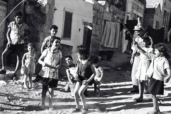 Children play in the alleyways of Jerusalem, 1955. Credit: Avraham Malavsky, KKL-JNF Archives.