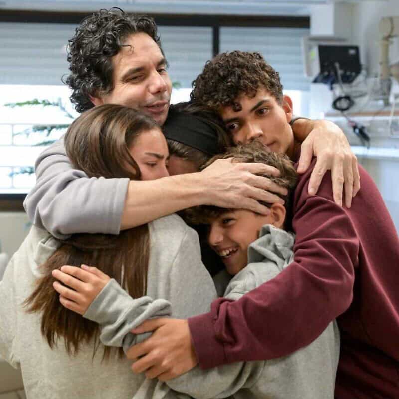 Ofer Kalderon reunites with his children Rotem, Gaya, Erez and Sahar on Feb. 1, 2025. Erez and Sahar, who were also abducted on Oct. 7, 2023, were released in November 2023. Photo by Maayan Toaf/GPO.