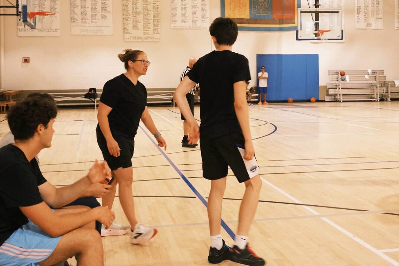 Dayna Greenfield is coaching Pittsburgh’s 17U boys basketball team at the JCC Maccabi Games. Photo by Hallie Cohen.