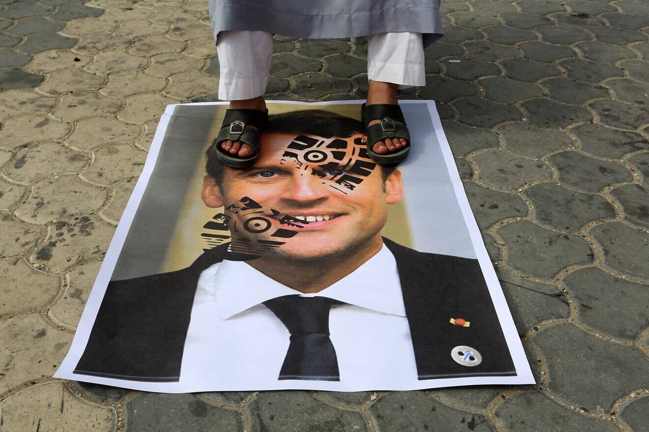 Palestinians in Khan Yunis, in the southern Gaza Strip, protest against the publications of a cartoon of Prophet Mohammad in France and ensuing comments by French President Emmanuel Macron, Oct. 30, 2020. Photo by Abed Rahim Khatib/Flash90.