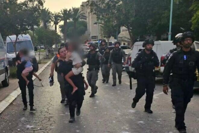First Sgt. Lielle Dahan (center) in Beersheva after an Iranian missile strike, June 24, 2025. Credit: Israel Police.