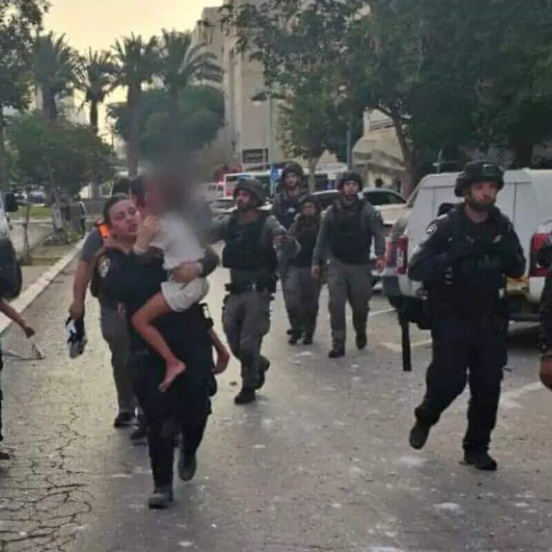 First Sgt. Lielle Dahan (center) in Beersheva after an Iranian missile strike, June 24, 2025. Credit: Israel Police.