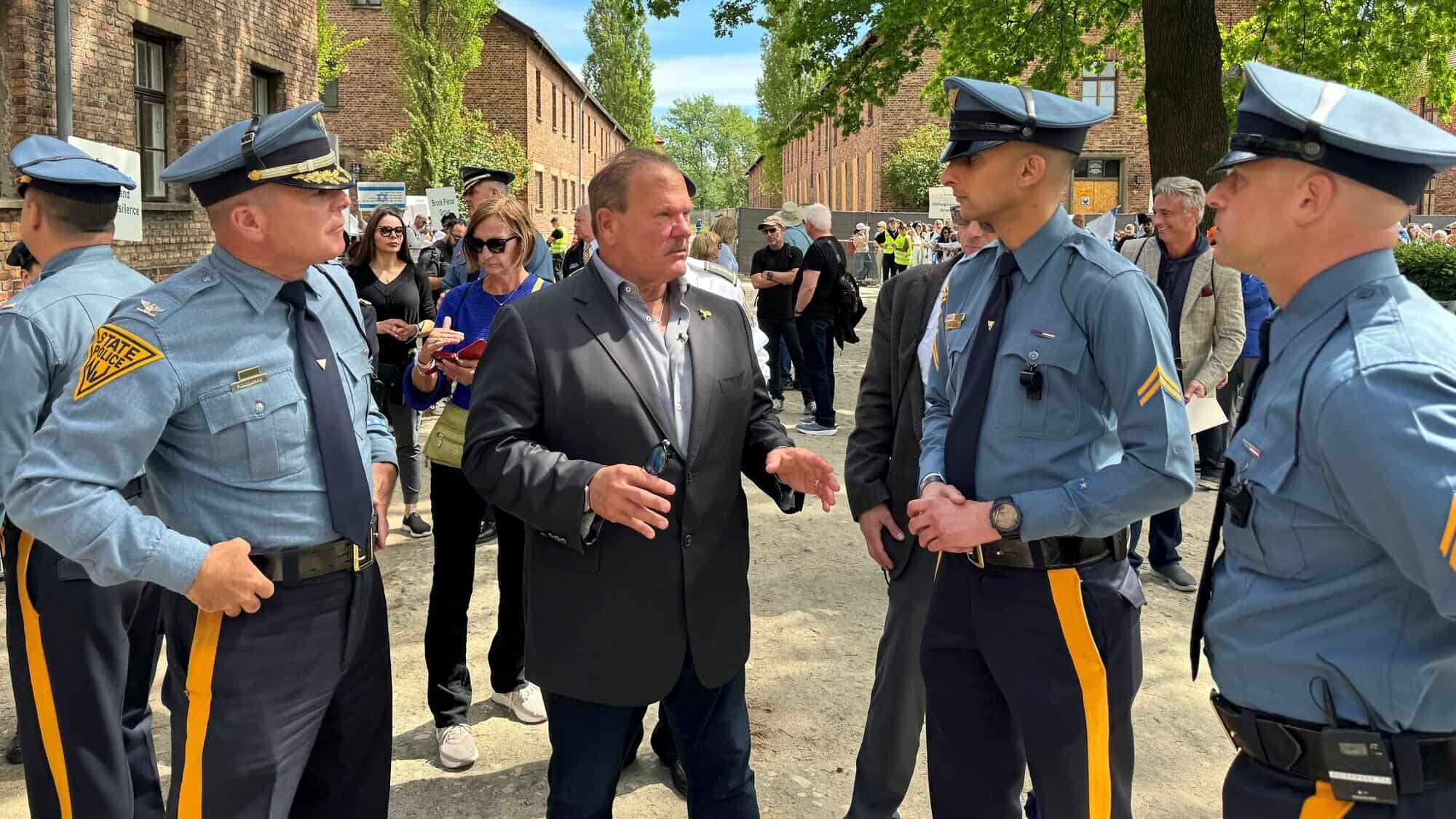 From left: Col. Patrick Callahan, superintendent of the New Jersey State Police; Paul Goldenberg; Sgt. Mudduser Malik, president of the Muslim Troopers Association; and Lt. Marc Zislin, president of Jewish Troopers Association at the grounds of Auschwitz for the March of the Living, May 6, 2024. Photo by Mark Genatempo.