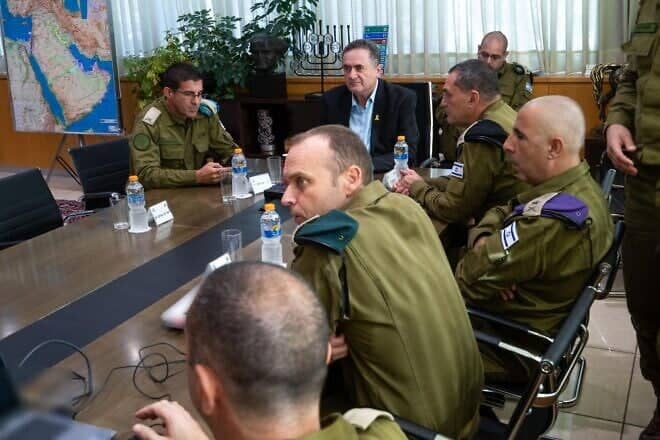Israel's Defense Minister Israel Katz (top) and IDF Chief of Staff Lt. Gen. Eyal Zamir (seated to Katz's left) at a briefing. Photo by Ariel Hermoni/Ministry of Defense.