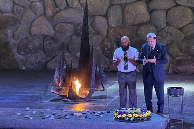 Imam Hassen Chalghoumi (left), chairman of the Conference of Imams of France, and Dahri Nour Mouhammad, executive director of Islamic Theology of Counter Terrorism, pray at Yad Vashem, The World Holocaust Remembrance Center in Jerusalem, on July 7, 2025. Credit: Yad Vashem.