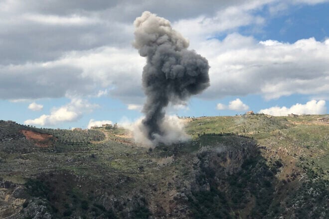 Smoke billows from the site of Israeli artillery shelling that targeted the area of the southern Lebanese village of Yohmor in response to rocket fire, on March 22, 2025. Photo by Rabih Daher/AFP via Getty Images.