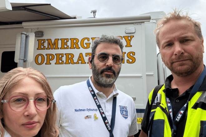 ZAKA international commander Nachman Dyksztejn (center) worked in close coordination with members of the Texas A&M Task Force 1 and under the supervision of the Texas Division of Emergency Management, July 2025. Credit: Courtesy of ZAKA.
