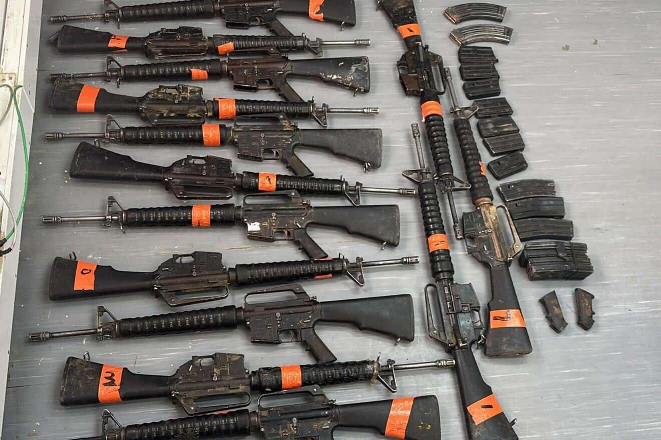 Confiscated weapons seized by IDF soldiers following two smuggling attempts on the Egyptian border, July 2, 2025.  
Credit: IDF.