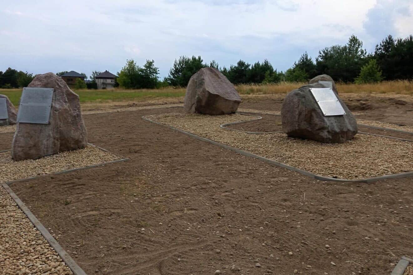 Boulders bearing ahistorical, revisionist text about the 1941 massacre in Jedwabne are on display next to the official commemorative site in eastern Poland on July 7, 2025. Photo by Kamil Mrozowicz.