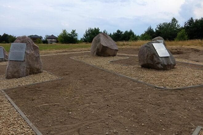 Boulders bearing ahistorical, revisionist text about the 1941 massacre in Jedwabne are on display next to the official commemorative site in eastern Poland on July 7, 2025. Photo by Kamil Mrozowicz.