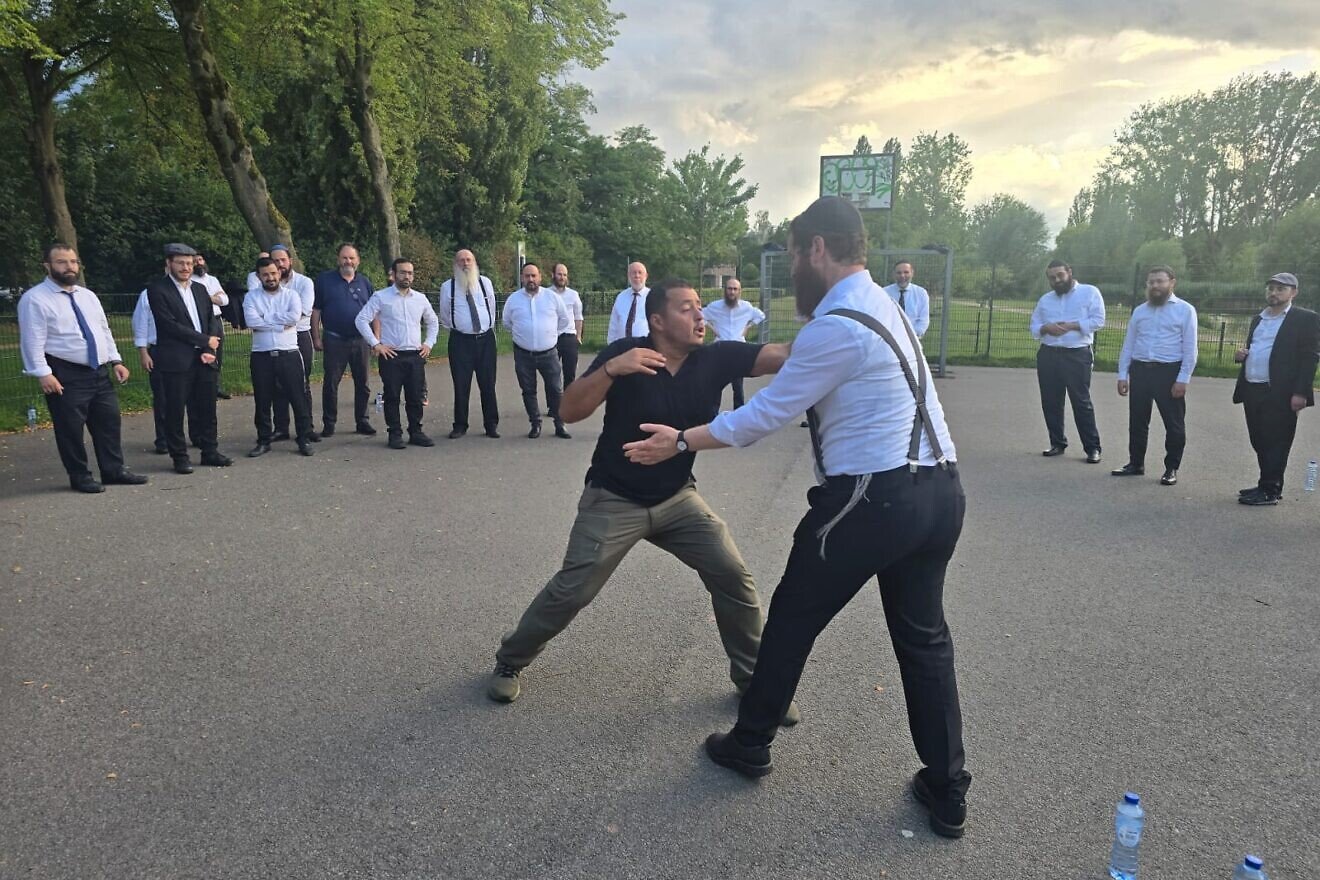 A guide trains rabbis in krav maga in Eindhoven, the Netherlands on July 22, 2025. Photo credit: RCE.