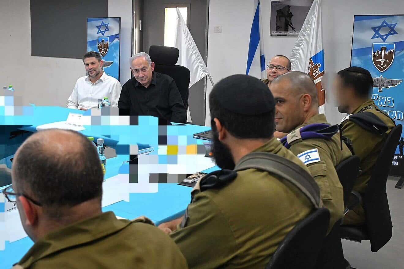 Israeli Prime Minister Benjamin Netanyahu and Finance Minister Bezalel Smotrich visit the Hasmonean Brigade training site at IDF Camp Tevetz, July 15, 2025. Photo: Haim Zach/GPO.
