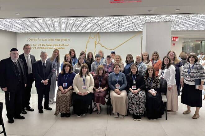 Left to right: OU Kosher ‘s chief operating officer Rabbi Moshe Elefant; managing director of community relations Rabbi Eli Eleff; and chief executive officer Rabbi Menachem Genack, with a group of seminar participants  at the ASK OU 2025 Summer Women's Kashrus Experience. Credit: Courtesy.