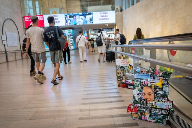 Posters of Israelis held hostage by Hamas in Gaza are displayed at Ben Gurion International Airport, near Tel Aviv, July 13, 2025. Photo by Chaim Goldberg/Flash90.