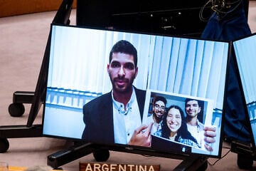 Ilay David, brother of hostage Evyatar David, speaks on a screen during a meeting at United Nations headquarters in New York City on the medical condition of hostages held in the Gaza Strip, Aug. 5, 2025. Credit: Liri Agami/Flash90.