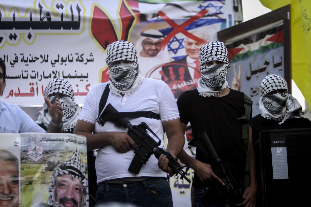 Members of Fatah's Al-Aqsa Martyrs Brigades take part in a military show as they protest against the deal between Israel and the United Arab Emirates, Aug. 22, 2020. Photo by Nasser Ishtayeh/Flash90.