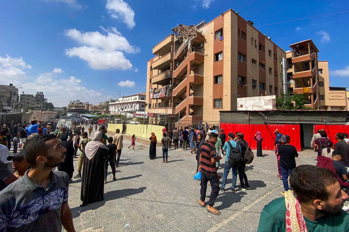 Palestinians gather outside of the Nasser hospital in Khan Yunis in the southern Gaza Strip following Israeli airstrikes on Aug. 25, 2025,. Photo by AFP via Getty Images.