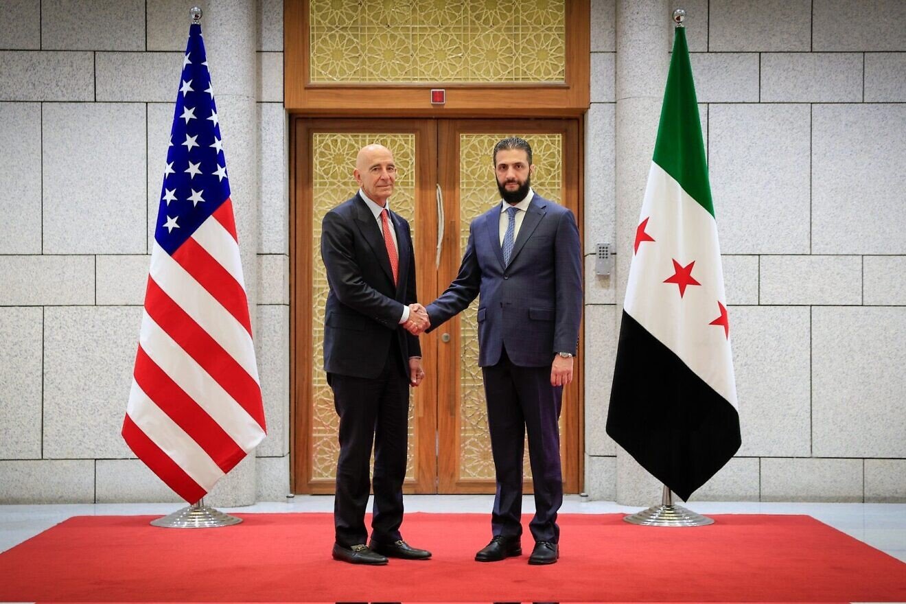 Tom Barrack, U.S. ambassador to Turkey, and Syrian President Ahmed al-Sharaa at the Syrian Presidential Palace in Damascus, Syria, May 2025. Credit: Ambassador Tom Barrack via Wikimedia Commons. Tom Barrack, U.S. ambassador to Turkey, and Syrian President Ahmed al-Sharaa at the Syrian Presidential Palace in Damascus, Syria, May 2025. Credit: Ambassador Tom Barrack via Wikimedia Commons.