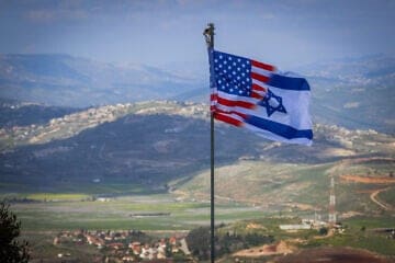 An American and Israeli combined flag on the Israeli border with Lebanon, March 30, 2025. Photo by David Cohen/Flash90.