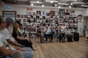 Holocaust survivors meet families of hostages and released hostages in Tel Aviv on August 5, 2025. Photo by Chen Schimmel. 