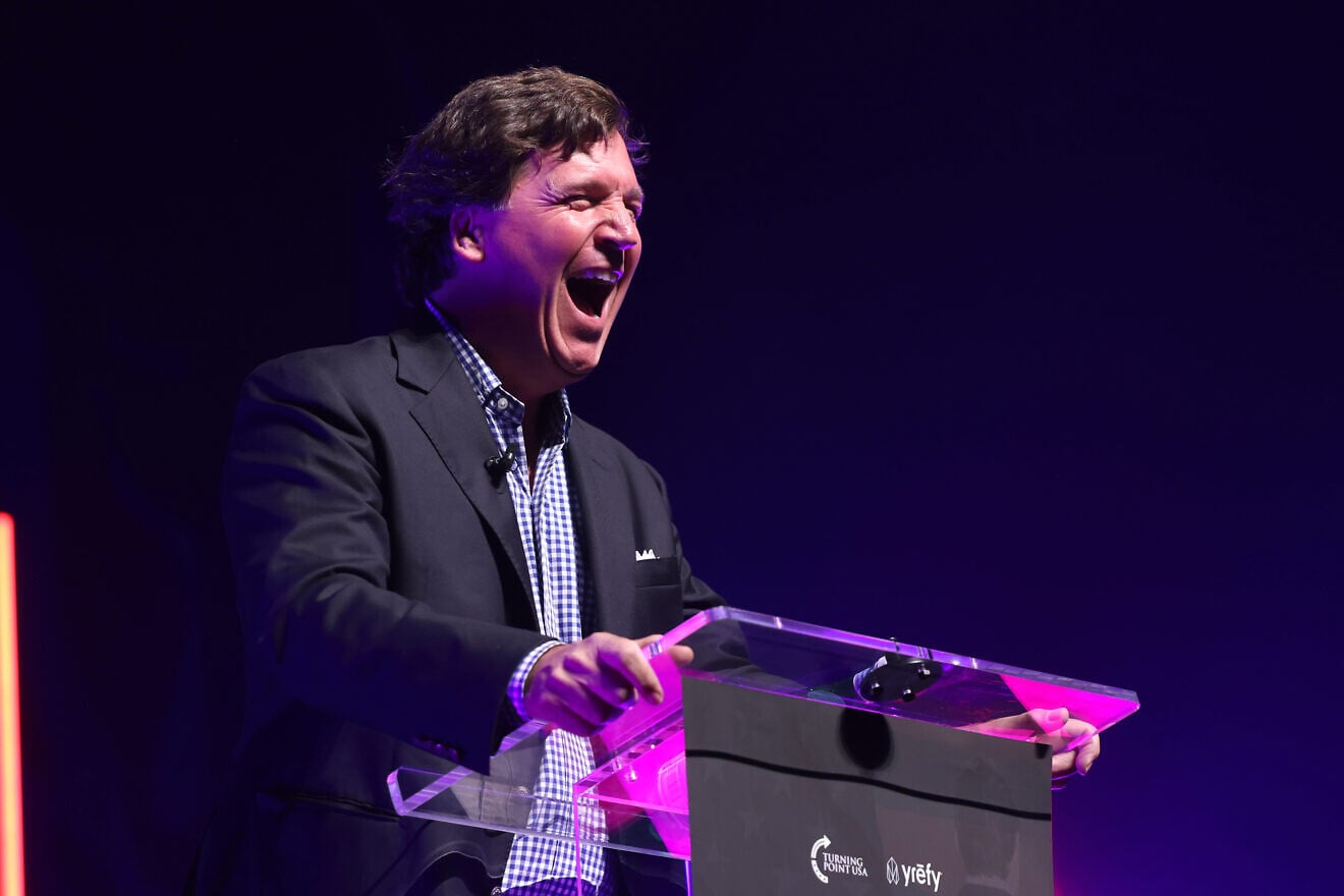 Tucker Carlson speaking with attendees at the Indiana University tour stop of the "This Is The Turning Point" tour at IU Auditorium in Bloomington, Ind., Oct. 21, 2025. Credit: Gage Skidmore via Creative Commons.