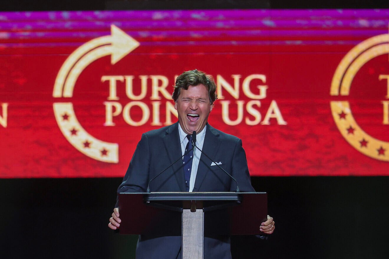 Conservative political commentator Tucker Carlson speaks during the memorial service for Charlie Kirk, the founder of Turning Point USA who was shot and killed while speaking at Utah Valley University on Sept. 10, at State Farm Stadium in Glendale, Ariz., on Sept. 21, 2025. Photo by Eric Thayer/Getty Images. Conservative political commentator Tucker Carlson speaks during the memorial service for Charlie Kirk, the founder of Turning Point USA who was shot and killed while speaking at Utah Valley University on Sept. 10, at State Farm Stadium in Glendale, Ariz., on Sept. 21, 2025. Photo by Eric Thayer/Getty Images.
