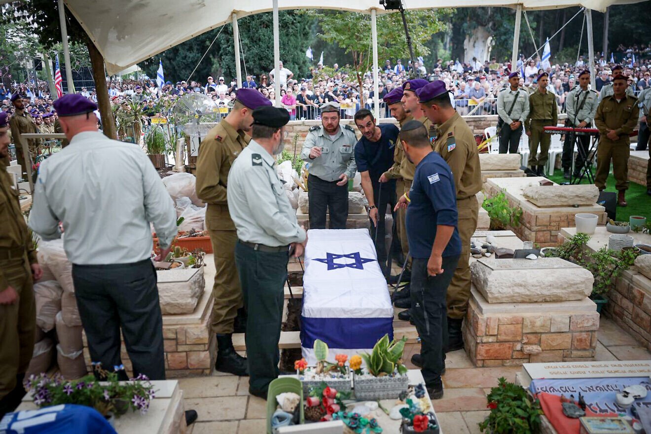 Family and friends attend the funeral of Israel Defense Forces Lt. Hadar Goldin, whose body had been held captive by Hamas in Gaza since 2014, at the Kfar Saba military cemetery, Nov. 11, 2025. Photo by Chaim Goldberg/Flash90.