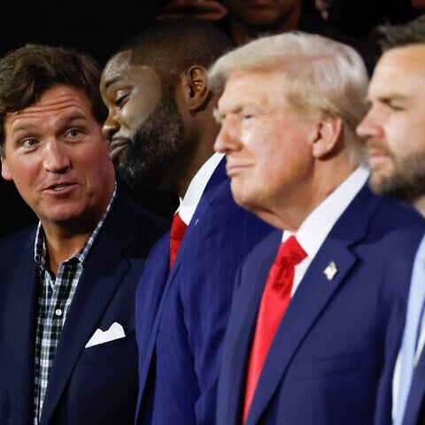 Tucker Carlson with then-U.S. presidential candidate Donald Trump and vice presidential candidate J.D. Vance on the first day of the Republican National Convention at the Fiserv Forum in Milwaukee, Wisconsin, July 15, 2024. Photo by Chip Somodevilla/Getty Images.