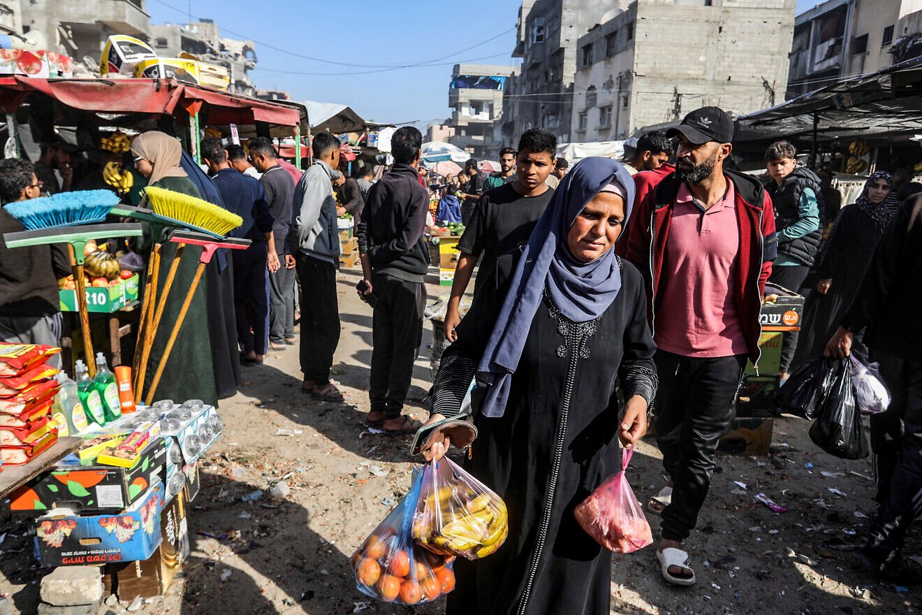Palestinians shop at a market in Khan Yunis, in the southern Gaza Strip, on Nov. 21, 2025. Photo by Abed Rahim Khatib/Flash90.