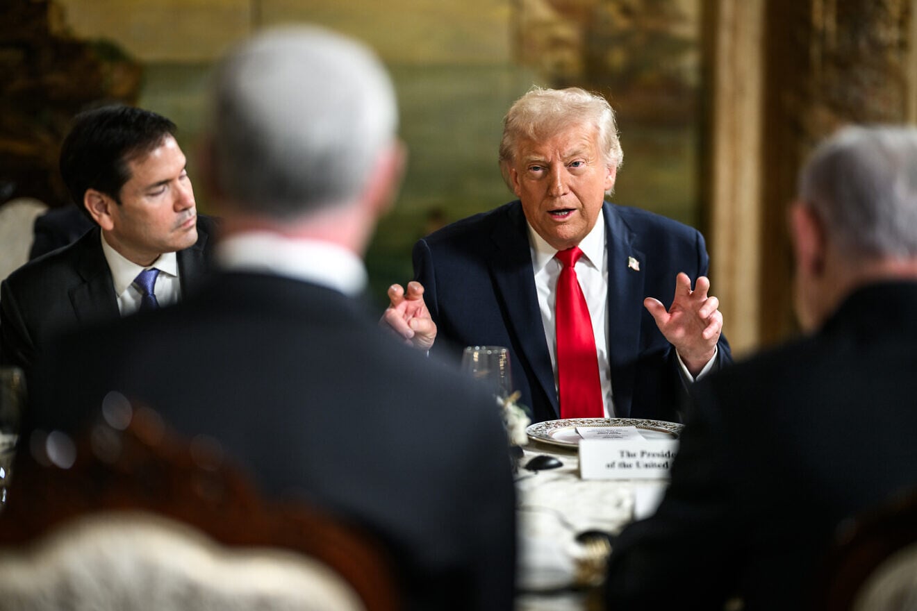 Trump hopes Iran crisis at bay leaves door open to strike