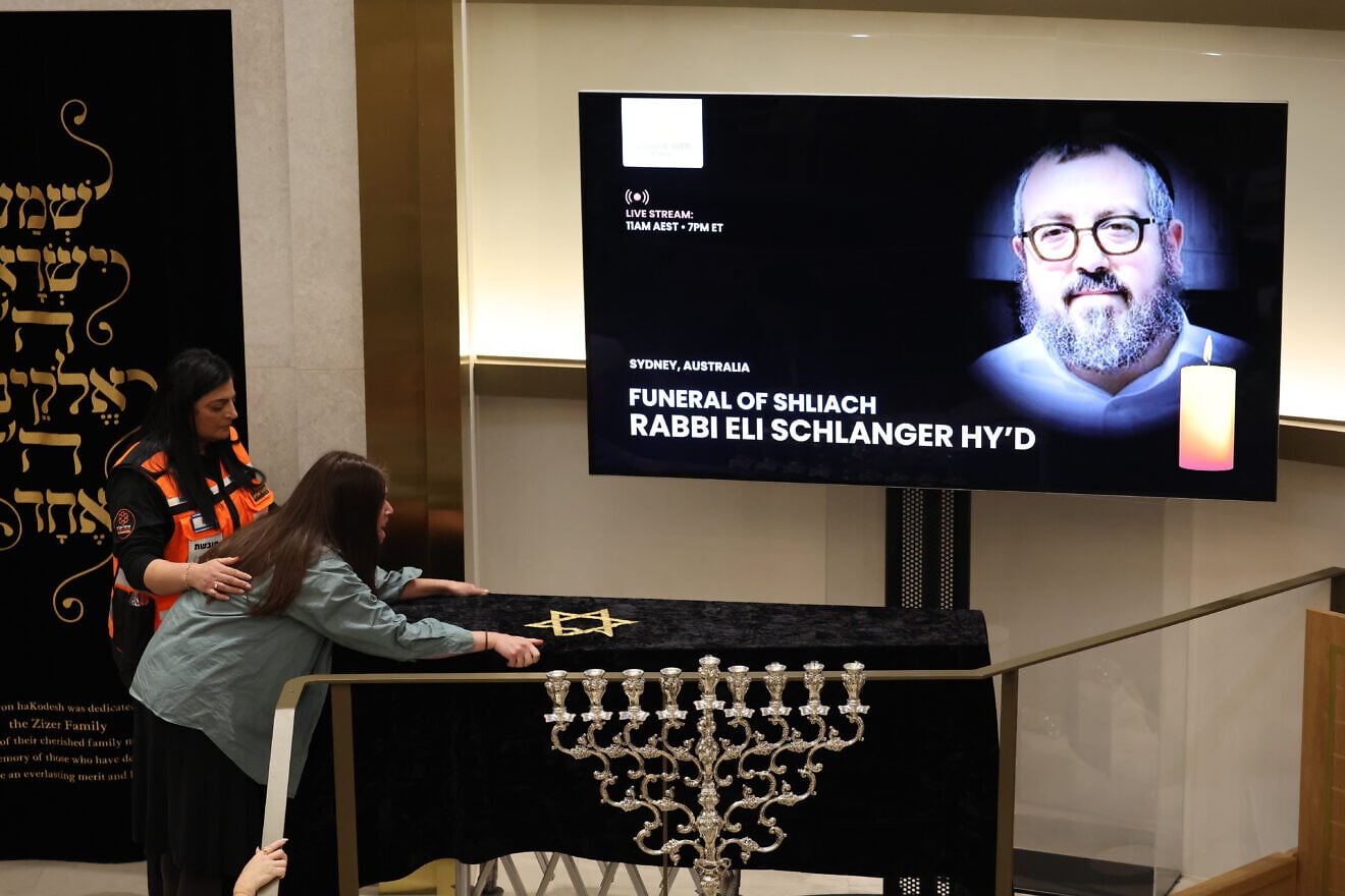 A family member of Rabbi Eli Schlanger, a victim in the Bondi Beach mass shooting, during his funeral at Chabad of Bondi in Sydney, Australia, on Dec. 17, 2025. Photo by Hollie Adams-Pool/Getty Images. A family member of Rabbi Eli Schlanger, a victim in the Bondi Beach mass shooting, during his funeral at Chabad of Bondi in Sydney, Australia, on Dec. 17, 2025. Photo by Hollie Adams-Pool/Getty Images.