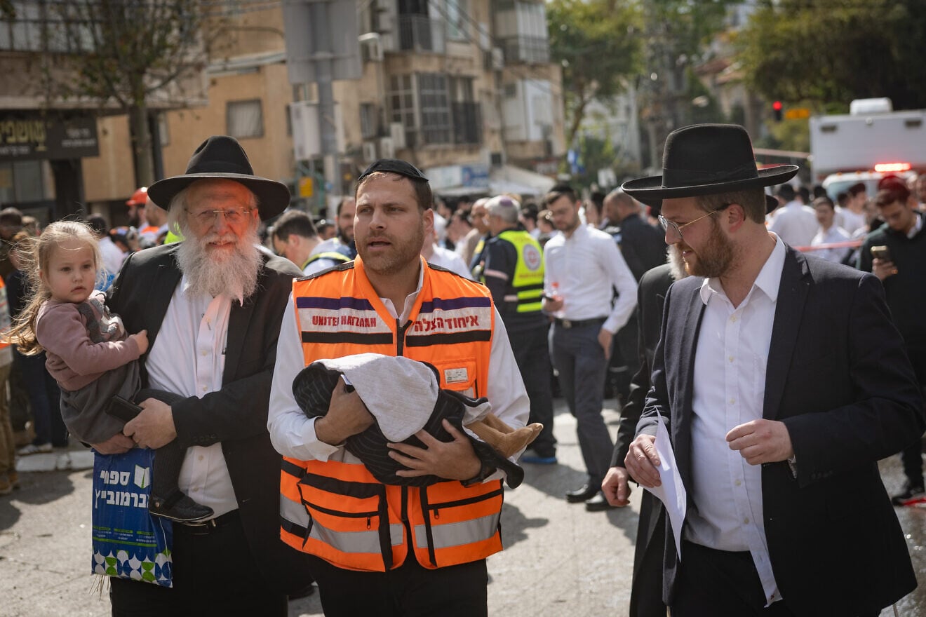 Israeli security and rescue personnel inspect the damage from an Iranian missile in Bnei Brak, east of northern Tel Aviv, March 15, 2026. Photo by Chaim Goldberg/Flash90.