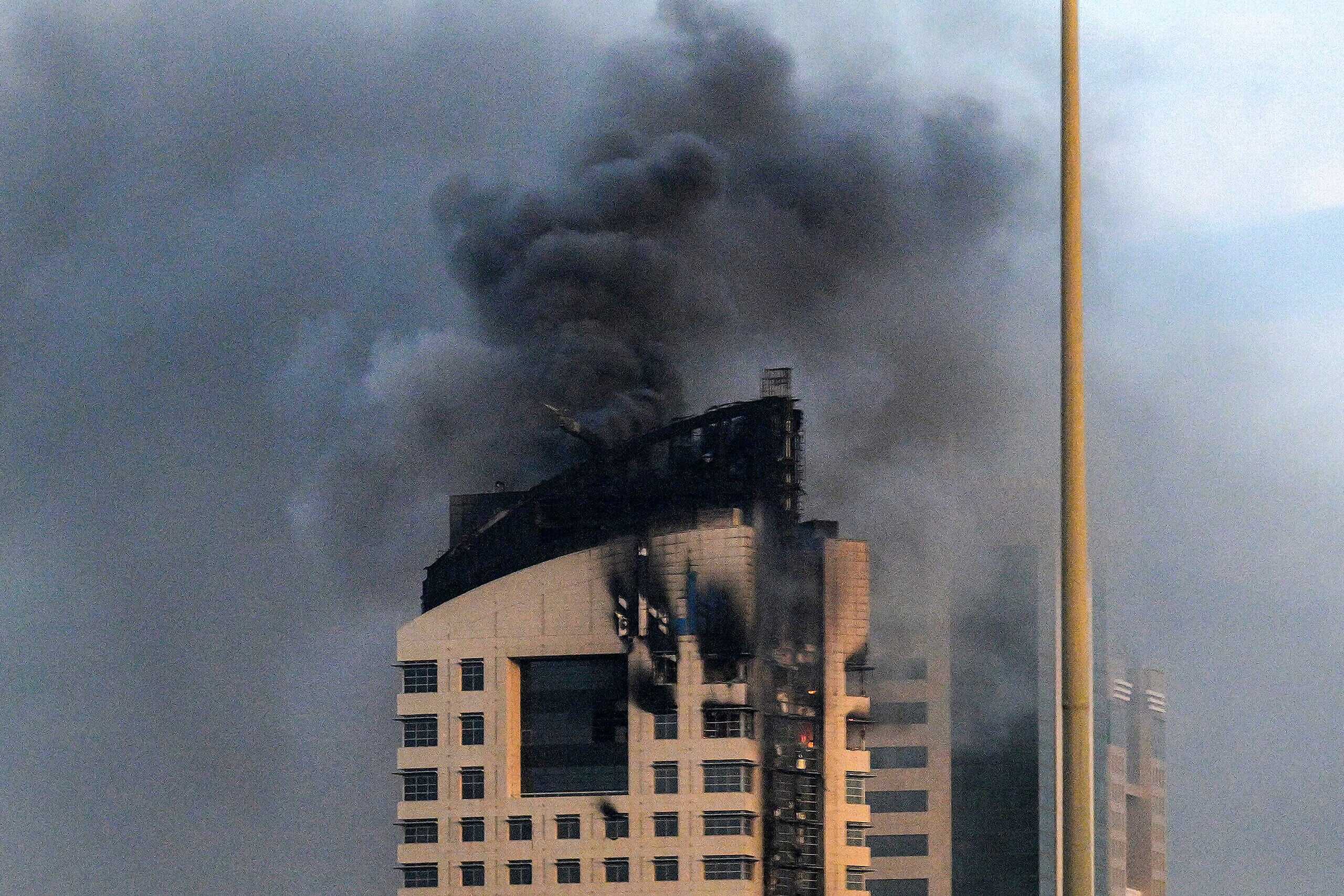 Iran strikes Gulf states; 2 killed, building burns in Kuwait - JNS.org